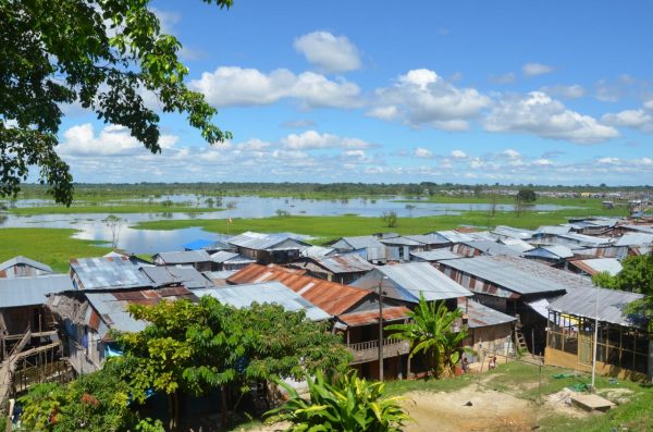 Houses next to water in Iquitos, Peru