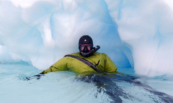 Waterproof Expeditions provides each participant a state-of-the-art Waterproof© D9 Snorkel Dry Suit – specially designed for polar snorkeling – as well as hood, gloves, boots and a full snorkel set including fins, mask and snorkel. Photo by Aurora Expeditions