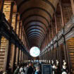 The real Long Room Library at Trinity College, wiht the Gaia Installation (a hovering globe) in the distance